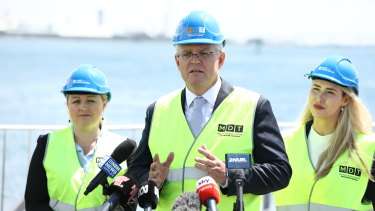 Prime Minister Scott Morrison in Newcastle with Liberal candidates Nell McGill and Brooke Vitnell. The NSW division of the party has set a target for 50 per cent of federal candidates to be women.