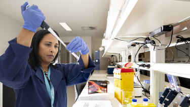 Professor Sudha Rao combines reagents for cancer biomarker detection at the Melanie Swan Memorial Translational Centre.