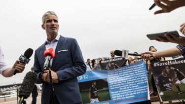 Former Socceroos star Craig Foster with demonstrators urging Thailand to release Hakeem al-Araibi, a Melbourne refugee and football player.