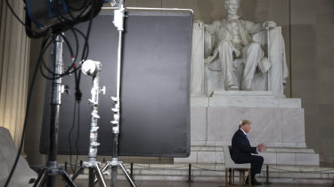 US President Donald Trump speaks during a Fox News town hall at the Lincoln Memorial in Washington, DC.
