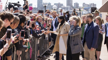 The Duke and Duchess Harry and Meghan meet the crowd outside the Opera House.