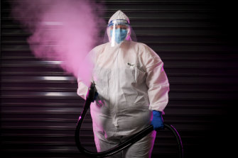 Trudi Brown (with steaming machine) is part of a team of "trauma cleaners" at STC Services who normally decontaminate crime scenes across Melbourne now turning their attention to COVID-19.