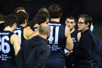 Blues coach David Teague talks to his players during Saturday night’s clash.