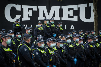 Police outside the CFMEU’s office last month.
