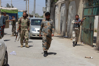 Afghan security personnel patrol during fighting between Taliban and Afghan security forces in Kunduz city, north of Kabul, Afghanistan, on Thursday, June 24, 2021. 