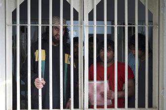 Jailed Taliban members are seen inside the Pul-e-Charkhi jail in Kabul, Afghanistan late last year. 