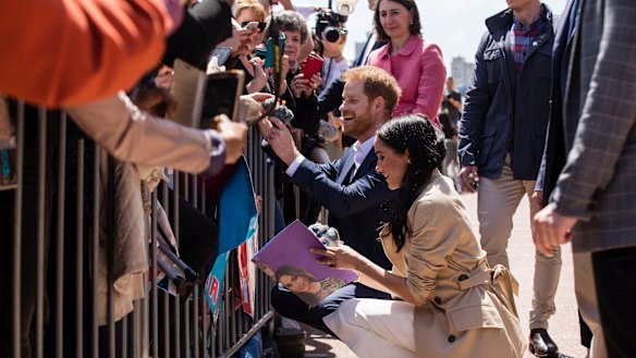 The Duke and Duchess, Harry and Meghan meet the crowd outside the Opera House after being welcomed by Premier Gladys Berejiklian.