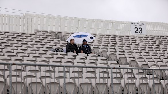 Football games were played to largely empty stadiums at the weekend  after the federal government announced an upcoming ban on gatherings of more than 500 people.