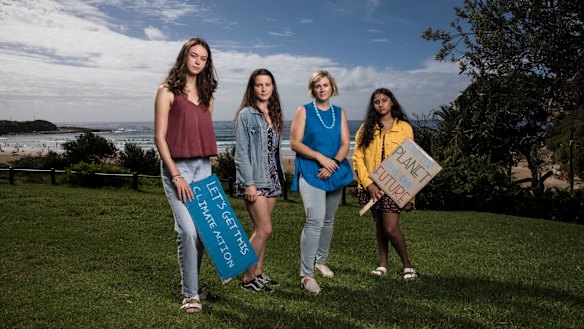Independent candidate for Warringah, Zali Steggall, with young climate activists (L-R) Vivienne Paduch (15), Alexia Giannesini (16) and Manjot Kaur (17) at Freshwater Beach.