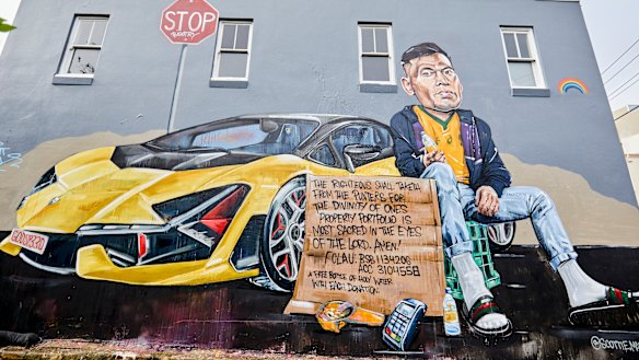 The mural of Israel Folau by artist Scott Marsh on the side of the Botany View Hotel.