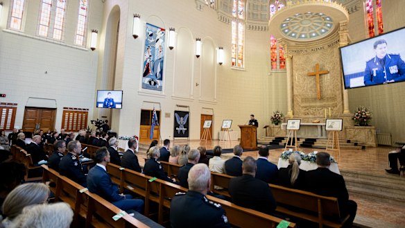 Mr Patton speaks at the private memorial service on Thursday.