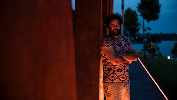 Artist Jacob Nash with his sculpture ALWAYS at Barangaroo Reserve in Sydney.