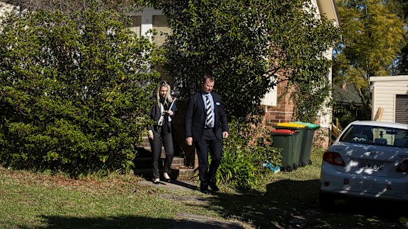 Detectives leave the house where Jack and Jennifer Edwards were murdered by their father, John Edwards, in 2018.  