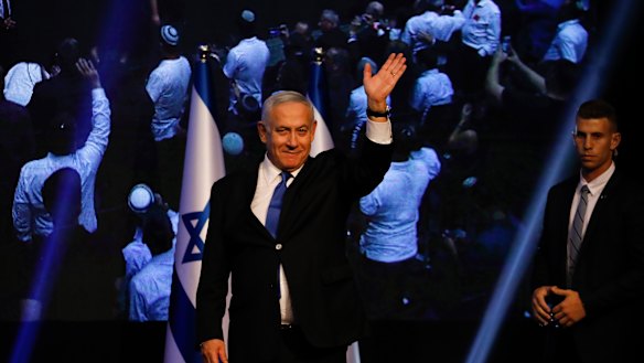 Israeli Prime Minister Benjamin Netanyahu addressees his supporters at party headquarters after elections in Tel Aviv in the early hours of Wednesday.