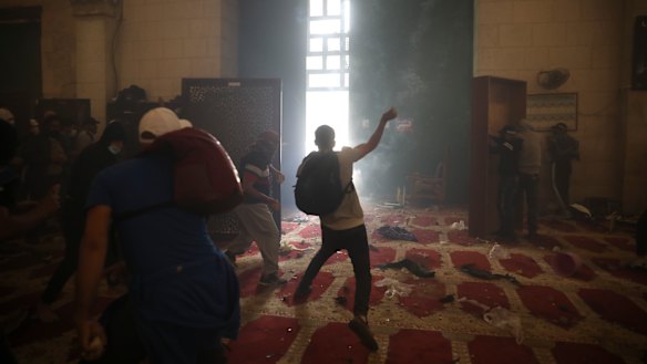 Palestinians clash with Israeli security forces at the al-Aqsa Mosque compound in Jerusalem’s Old City.