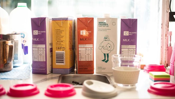 Spoiled for choice: Macadamia, soy, almond and oat milk cartons at Cuckoo Callay cafe in Surry Hills.