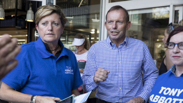 Tony Abbott out on the hustings in Warringah with his sister Christine Forster and her wife Virginia Flitcroft.