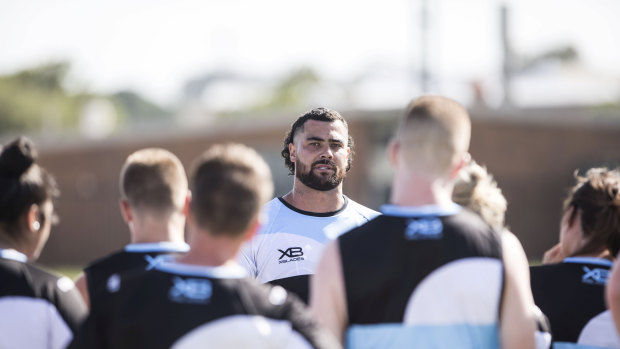 Hair apparent: Andrew Fifita sports his new look at Cronulla training.