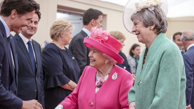 The Queen, accompanied by Prime Minister Theresa May meets with Canada Prime Minister Justin Trudeau during D-Day commemorations.