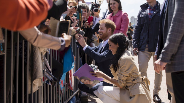The Duke and Duchess, Harry and Meghan meet the crowd outside the Opera House after being welcomed by Premier Gladys Berejiklian.