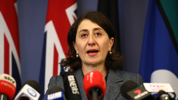 Gladys Berejiklian announcing her resignation to the media on Friday.