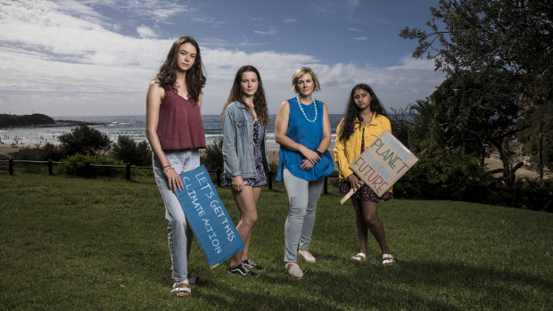 Independent candidate for Warringah, Zali Steggall, with young climate activists (L-R) Vivienne Paduch (15), Alexia Giannesini (16) and Manjot Kaur (17) at Freshwater Beach.