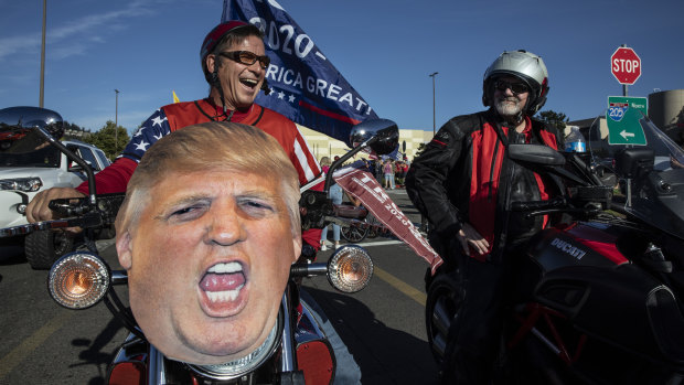 Supporters of President Donald Trump take part in the rally and car parade from Clackamas to Portland that ended in clashes with Black Lives Matter activists.