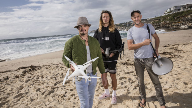 "A potential attack that we saved": Carl Ellis (from left), Josh Marx and Jason Iggleden from Drone Shark at Tamarama Beach.
