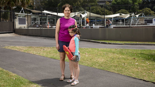 "I don't know what to do, I'm dreading it": Chloe Groom with her daughter Iris outside Victoria Park pool in Camperdown.