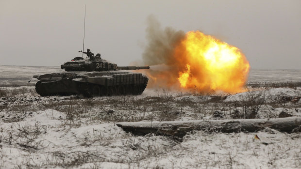 A Russian tank T-72B3 fires as troops take part in drills at the Kadamovskiy firing range in the Rostov region in southern Russia. 