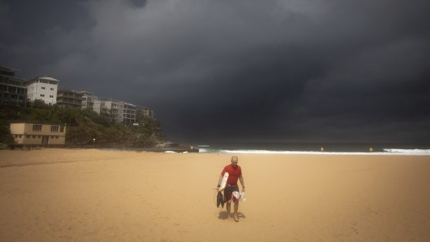 Dark storm clouds above Queenscliff Beach as wet weather rolled across NSW on Monday. 
