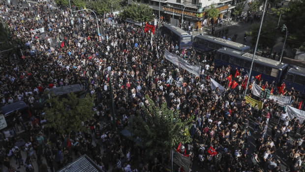 Thousands of people gather for an anti-fascist demonstration outside court in Athens on Wednesday.
