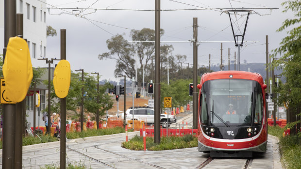 A light rail vehicle arrives at the Gungahlin terminus. There are concerns about the electric cabling on the project.