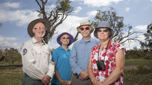 ACT government senior environmental planner Dr Michael Mulvaney and citizen scientists Jenny Tyrrell, Tom Tyrrell and Jacky Fogerty out looking for gang-gangs in Red Hill.