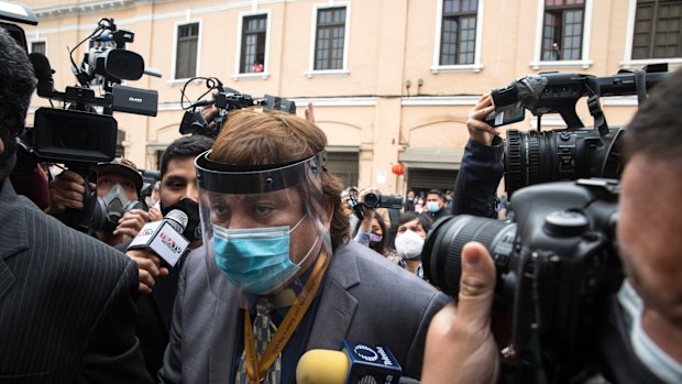 Peruvian event organiser and singer Richard Cisneros, known as Richard Swinger, arrives to the National Congress to deliver documents for an ongoing investigation.