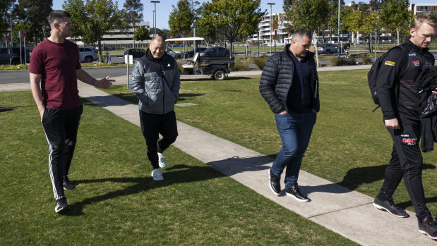 Panthers assistant coach Cameron Ciraldo with Eddie Jones and Anthony Seibold as they walk into the Penrith Panthers Academy on Wednesday.