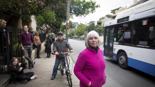 Glebe resident Di Anstey (front) and her neighbours say a pop-up cycleway on Bridge Road will make life more difficult for them.