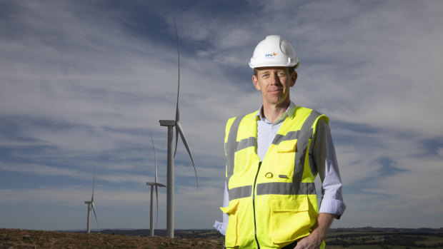 Minister for Climate Change and Sustainability Shane Rattenbury, pictured at the Crookwell 2 wind farm, said a peak in electricity prices would stabilise in the 2020s.