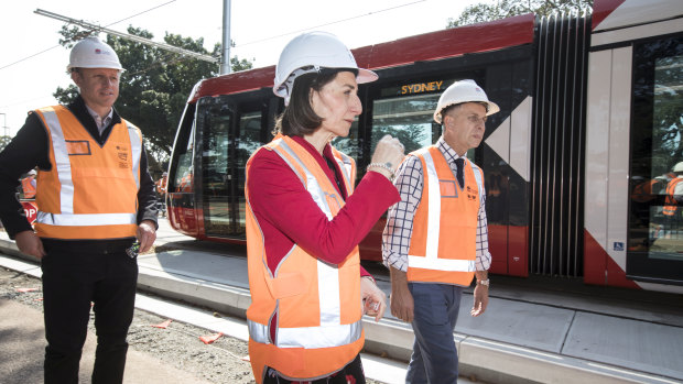 Premier Gladys Berejiklian and Transport Minister Andrew Constance, right, are hopeful that the line will be opened by the end of next year.