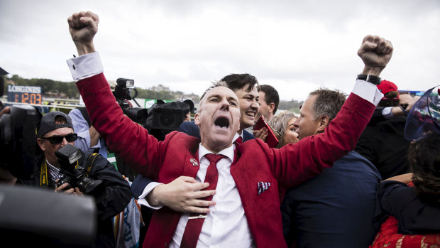 Punters celebrate Redzel winning the TAB Everest horse race at Royal Randwick last October.