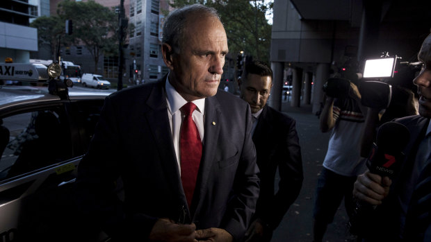 Outgoing NAB Chairman Ken Henry arrives at the ABC in Sydney for an interview on 7.30.