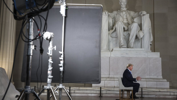 US President Donald Trump speaks during a Fox News town hall at the Lincoln Memorial in Washington, DC.