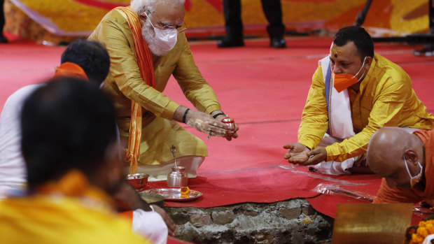 Indian Prime Minister Narendra Modi performs the groundbreaking ceremony of a temple dedicated to the Hindu god Ram in Ayodhya, India, last year. Modi  wants to see the Indian economy double in size by 2024.