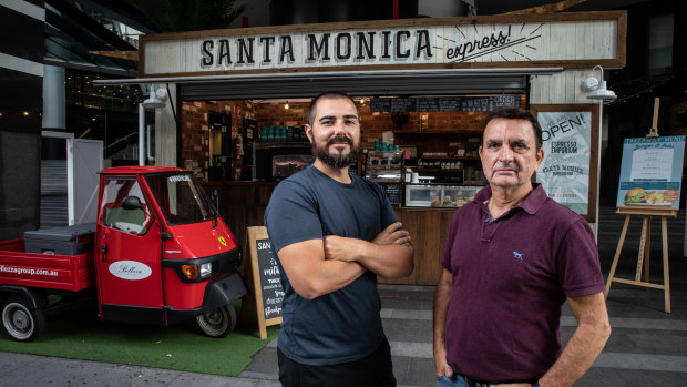 Giuseppe Petroccitto, left, and his father Jim are eager to reopen their popular Santa Monica restaurant and bar in Brisbane but still think caution is needed in easing restrictions.