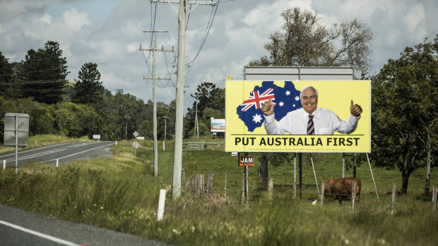 A Clive Palmer's United Australia Party billboard on the Bruce Highway near Mackay during last year's federal election. 