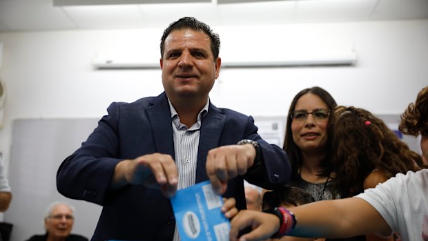 Israeli Arab politician Ayman Odeh casts his vote in Haifa, Israel.