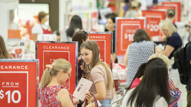 Shoppers browse the cosmetics section of Myer at the Canberra Centre during the Boxing Day sales on Wednesday.