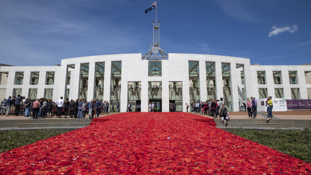 The approximately 270,000 poppies on the forecourt at Parliament House  have been handmade by men, women and children across Australia and overseas, as a tribute to Australians who have served in wars, conflicts and peace-keeping operations.