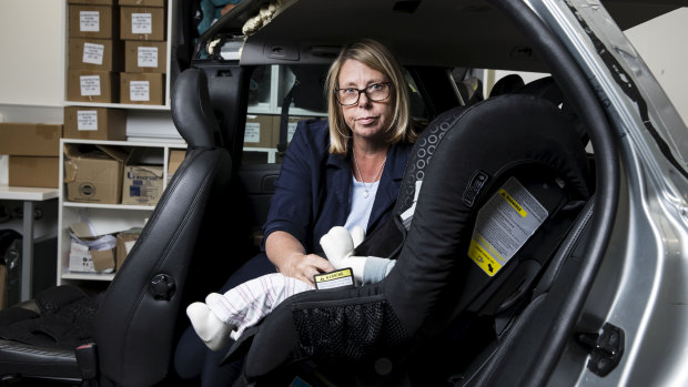 Associate Professor Dr Julie Brown with a child's car seat at Neuroscience Research Australia in Randwick.