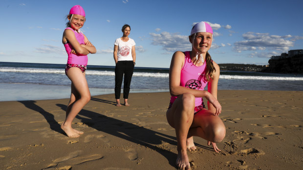 Piper Brenchley, mum Michal Brenchley and Ava Mcgettigan at Freshwater Beach.